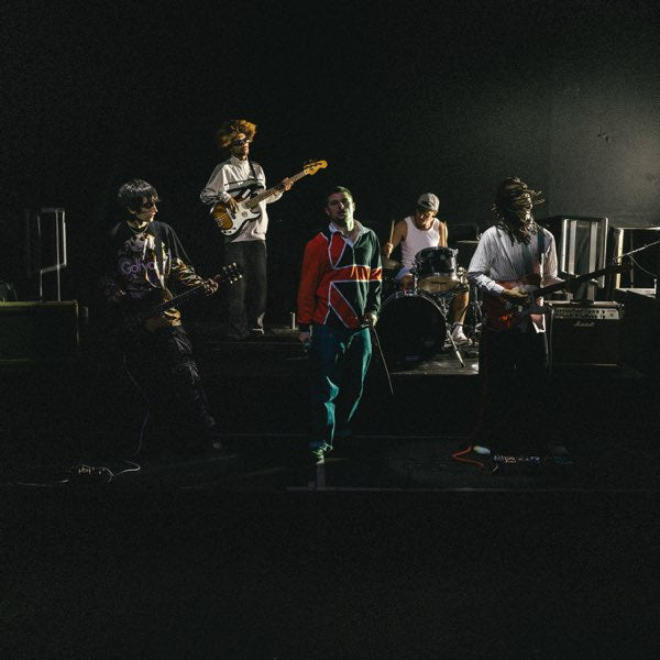 BBY’s 2 album artwork, showing the five musicians with instruments in a dark performance space